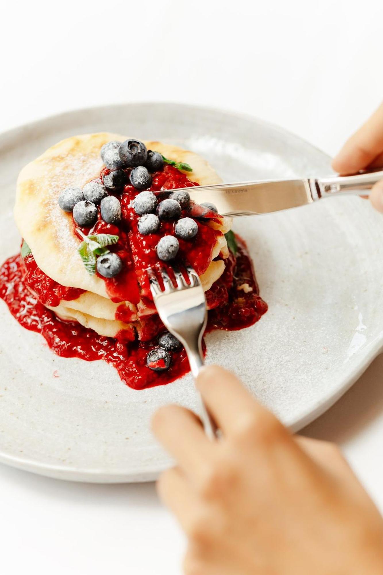 Viceroy Kopaonik Serbia Bagian luar foto A knife and fork cutting into a pancake